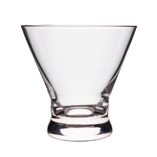 Clear glass cocktail glass on a white background