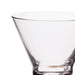 Clear glass cocktail glass on a white background