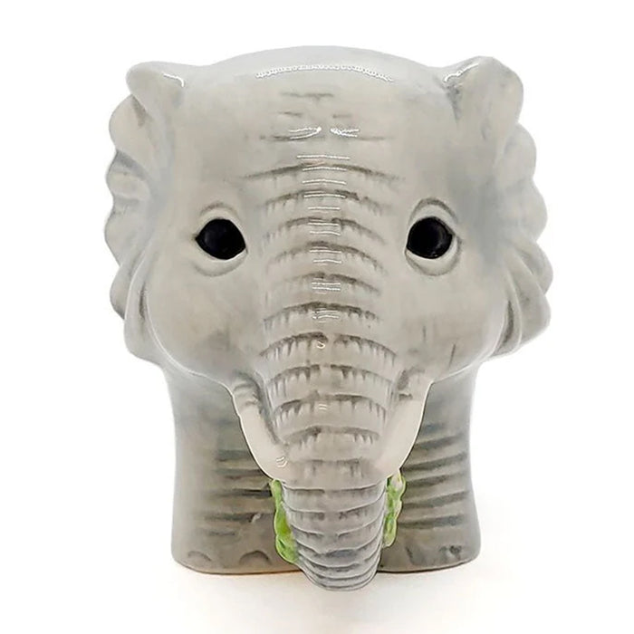 Ceramic elephant head on a white background