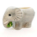 Ceramic elephant tiki on a white background