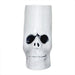 Skull-shaped mug with black eye sockets on a white background