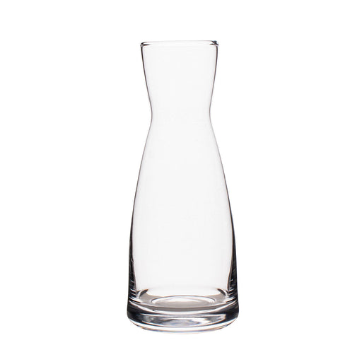 Clear glass carafe on a white background