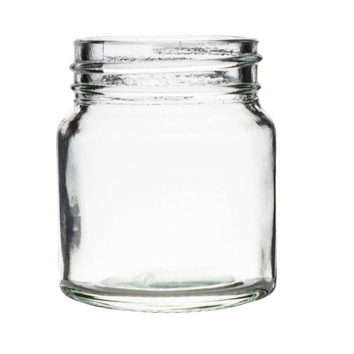 Clear glass jar on a white background