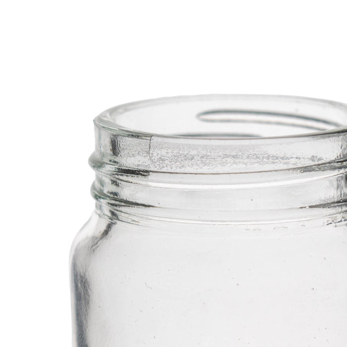 Clear glass jar on a white background
