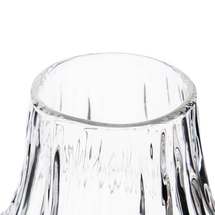 Clear glass with a unique design on a white background