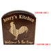 Wooden sign with rooster silhouette and engraved text 'Avery's Kitchen Welcome to the Coop' on a white background.