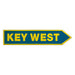 Directional sign pointing to 'Key West' with a blue background and yellow text.