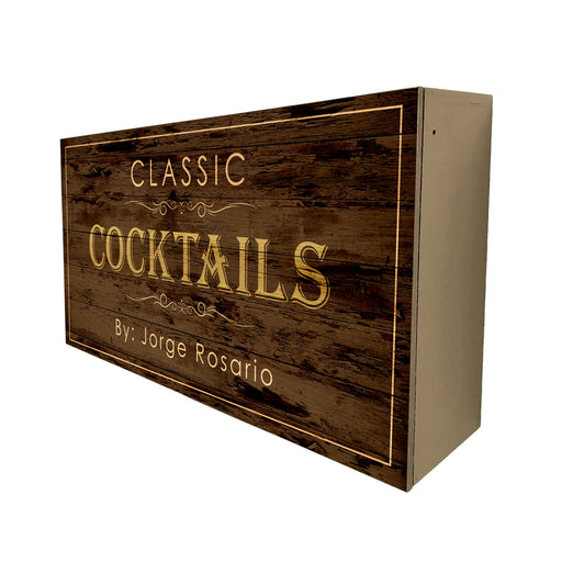 Wooden box with 'Classic Cocktails By: Jorge Rosario' text on a white background