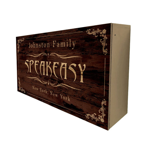 Wooden sign with 'Johnston Family Speakeasy New York, New York' text on a white background