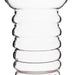 Clear glass vase with wavy design on a white background