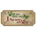 Wooden sign with decorative text 'Wine gets better with age, I age better with wine' on a white background.