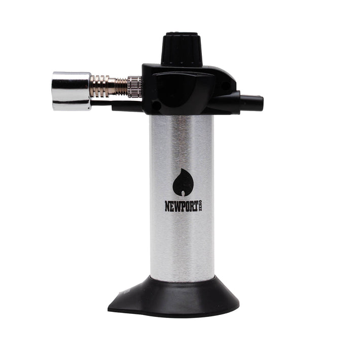 A portable torch lighter with a brushed silver aluminum body, black plastic top and base, and a chrome nozzle, featuring the Newport brand logo on the front.