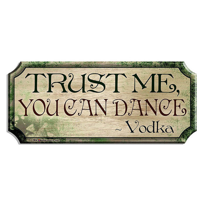 Decorative sign with text 'Trust Me, You Can Dance ~ Vodka' on a wooden background