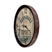 Wall clock with 'Hernandez Imports' design on a white background
