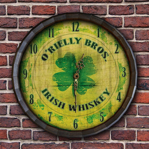 Round clock with 'O'Reilly Bros. Irish Whiskey' branding on a brick wall background