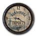 Wall clock with 'Hernandez Imports' design on a white background