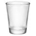 A clear shot glass with no visible contents, isolated on a white background.