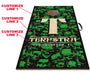 Cornhole board with green skull pattern and customizable text area, featuring the brand 'Terpstra'.