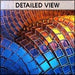 Mosaic artwork with a curved design featuring blue, orange, and yellow tiles.